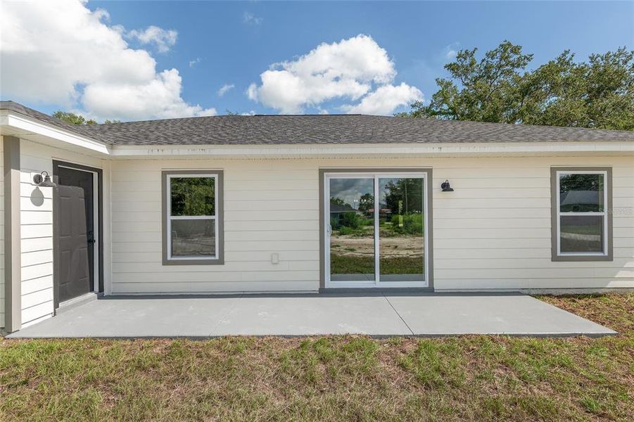 Front exterior of a new home in , Dunnellon, FL, highlighting curb appeal (Image 2).