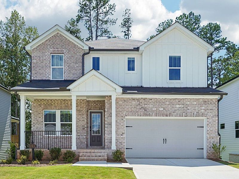 Front exterior of a new home in Martin Springs - Estate Series, Lawrenceville, GA, highlighting curb appeal (Image 1). Front exterior of a new home in Martin Springs - Estate Series, Lawrenceville, GA, highlighting curb appeal (Image 1).