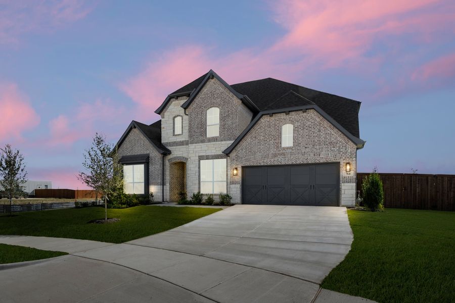 Front exterior of a new home in Myrtle Creek, Waxahachie, TX, highlighting curb appeal (Image 2). Front exterior of a new home in Myrtle Creek, Waxahachie, TX, highlighting curb appeal (Image 2).