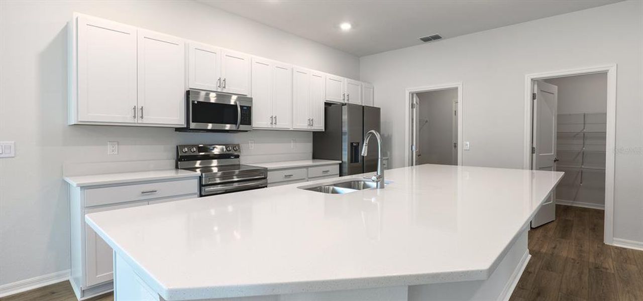 Furnished interior view inside a new home in Otter Woods Estates, Auburndale (Image 5).