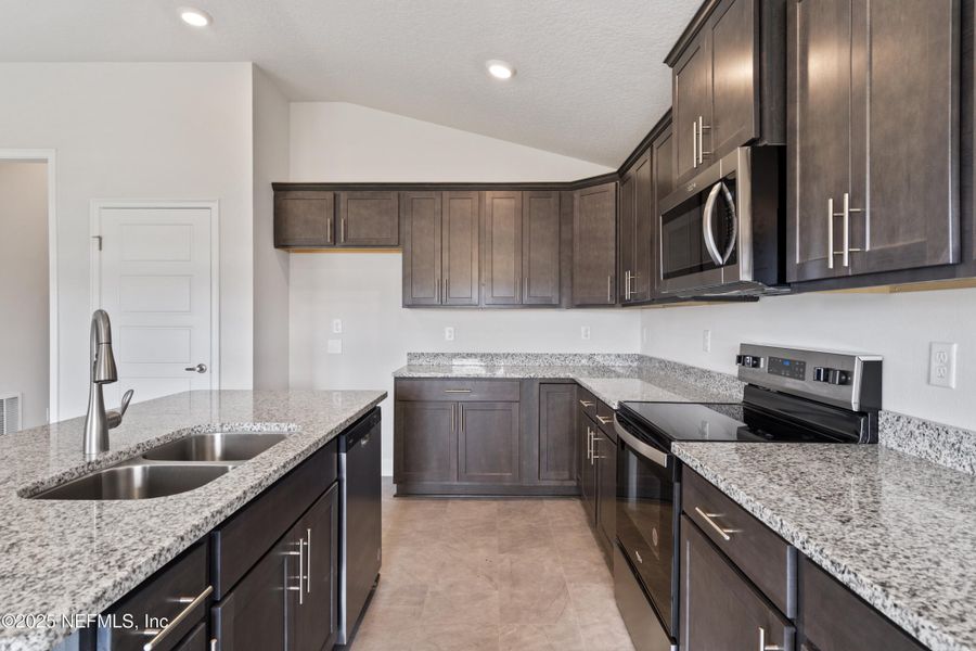 Furnished interior view inside a new home in Shadow Crest at Rolling Hills, Green Cove Springs (Image 5). Furnished interior view inside a new home in Shadow Crest at Rolling Hills, Green Cove Springs (Image 5).