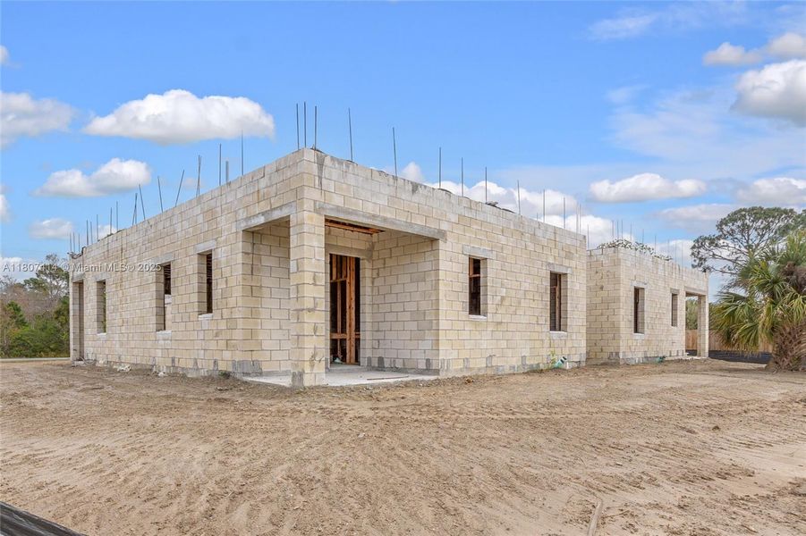 Front exterior of a new home in , Palm Bay, FL, highlighting curb appeal (Image 13).
