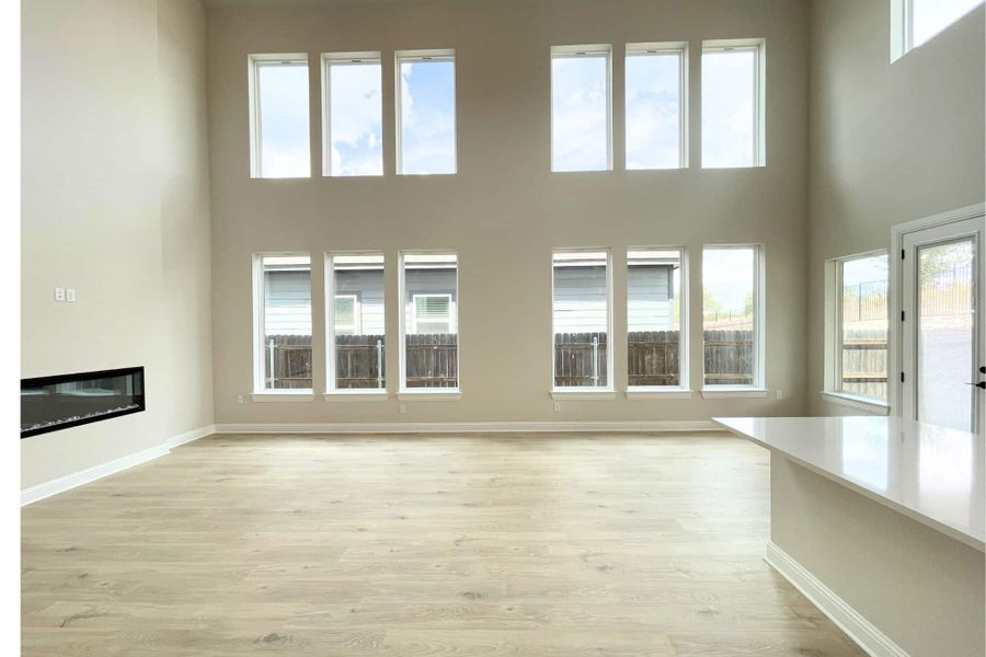 Spacious, unfurnished interior of a new home in Whisper Valley, Manor (Image 23).