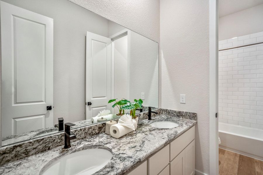 Furnished interior view inside a new home in ARTAVIA, Conroe (Image 16).