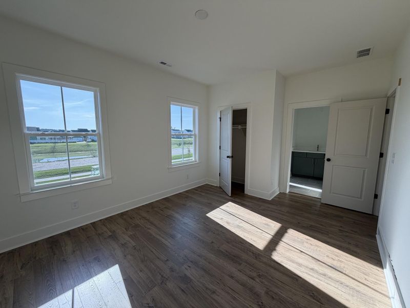 Spacious, unfurnished interior of a new home in The Domus Collection at Midtown Nexton, Summerville (Image 8).