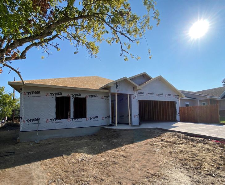 Front exterior of a new home in , Giddings, TX, highlighting curb appeal (Image 2). Front exterior of a new home in , Giddings, TX, highlighting curb appeal (Image 2).