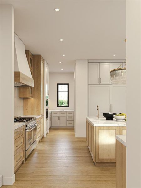 Gourmet kitchen featuring wood-finish flooring, recessed lighting, a range with a custom wood hood, stainless steel appliances, and an island with a sink and pendant light fixture