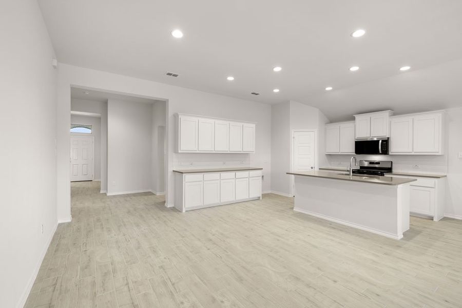 Representative exterior photo of a completed home built from the Austin by Impression Homes in Baker Farms, Cleburne, TX (Image 10).