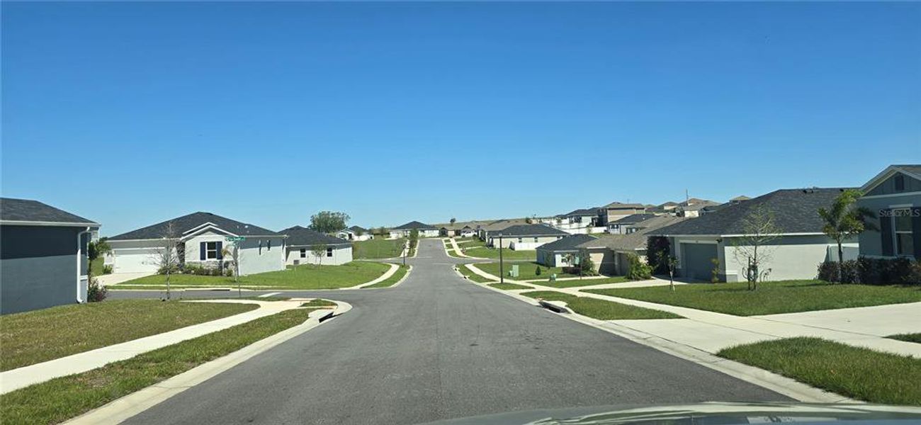 Front exterior of a new home in , Mascotte, FL, highlighting curb appeal (Image 18). Front exterior of a new home in , Mascotte, FL, highlighting curb appeal (Image 18).