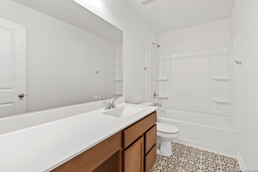 Furnished interior view inside a new home in Spanish Trails Villas, San Antonio (Image 11).