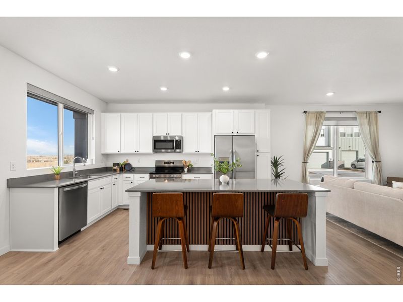 Furnished interior view inside a new home in Whisper Village, Arvada (Image 10).