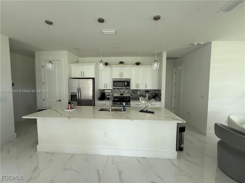 Furnished interior view inside a new home in , Lehigh Acres (Image 11).