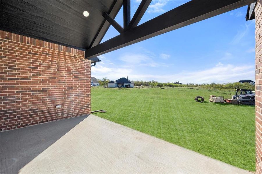 View of yard with a patio