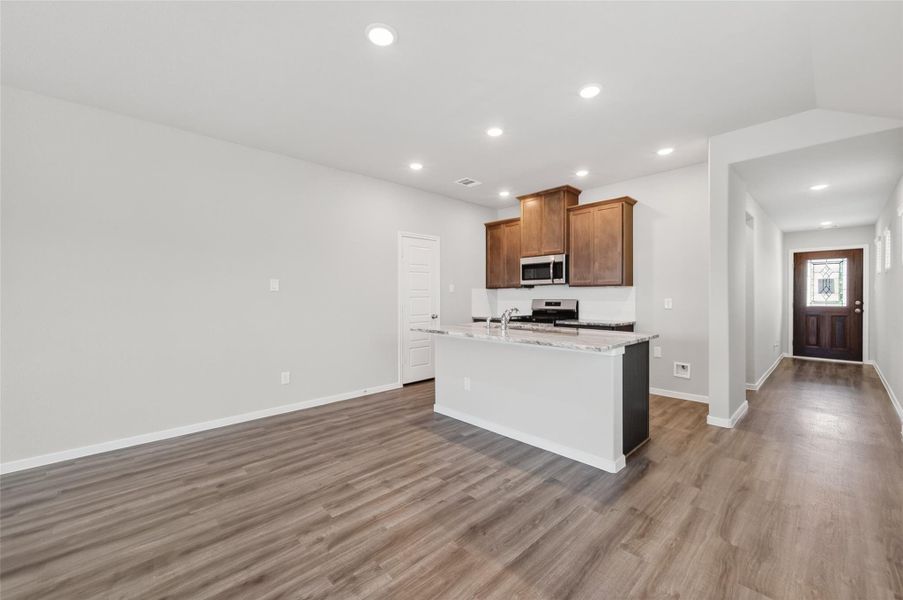 Furnished interior view inside a new home in Sunterra, Katy (Image 14).