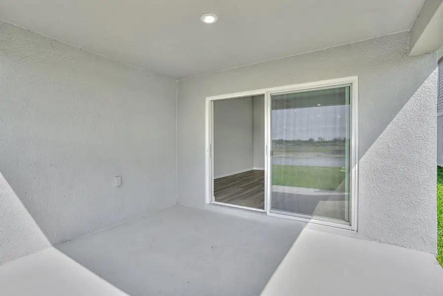 Exterior details and patio area of a home in Davis Landing, Wimauma (Image 3).