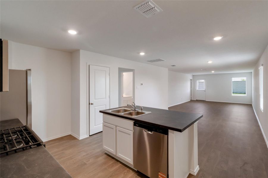Furnished interior view inside a new home in Watermill, Uhland (Image 3).