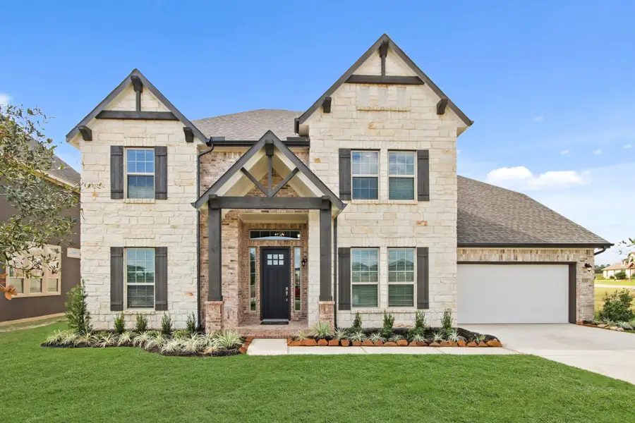 Gorgeous Jonathan home design by K. Hovnanian® Homes with elevation C in beautiful Waterstone on Lake Conroe.