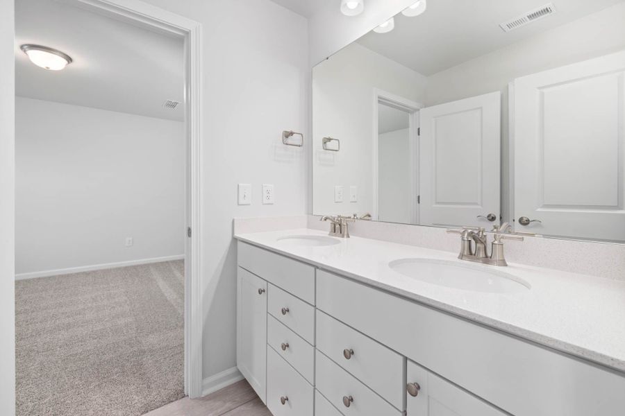 Furnished interior view inside a new home in Huxley, Apex (Image 8).