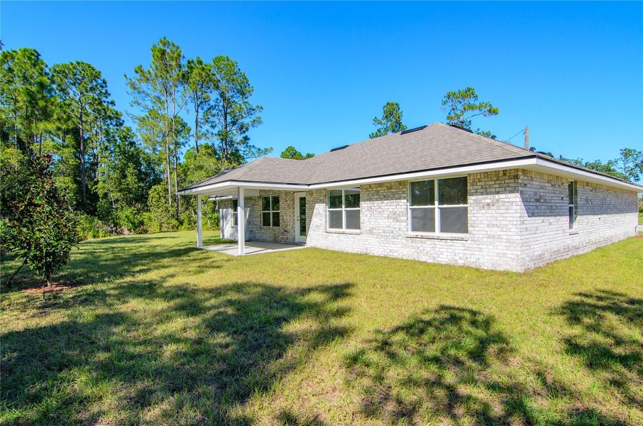 Exterior details and patio area of a home in Palm Coast, Palm Coast (Image 18).