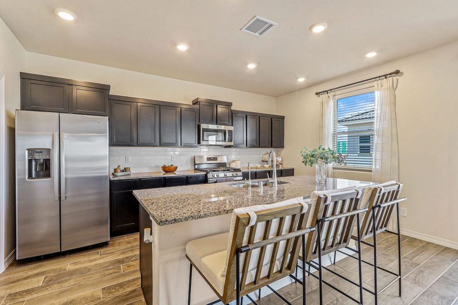 Representative furnished interior of a home built from the Blue Agave by View Homes in Paseos Del Este, Horizon City (Image 20).