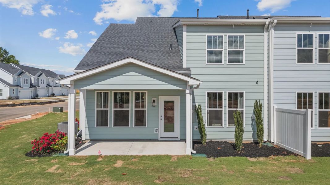 Exterior details and patio area of a home in Village at Midway, Anderson (Image 3).