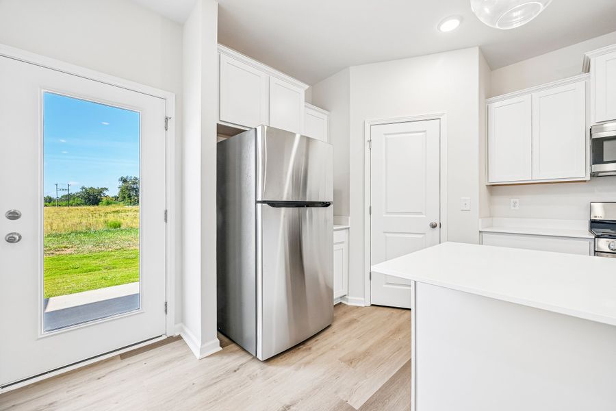 Furnished interior view inside a new home in Trenton Place, Roebuck (Image 13).