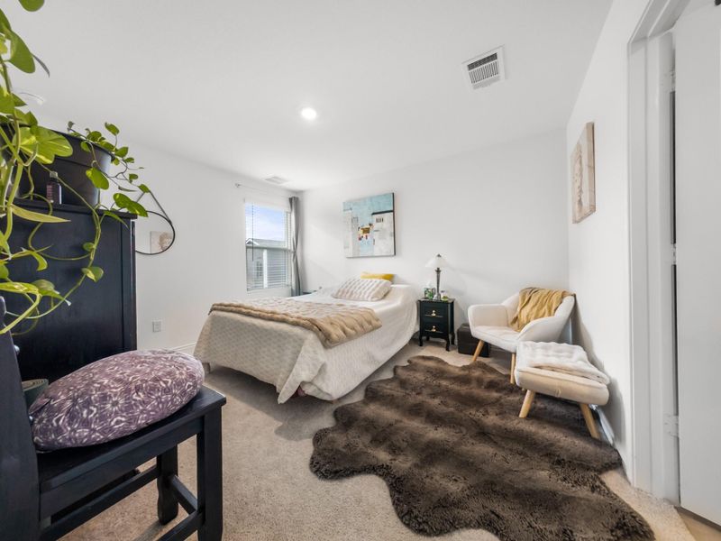 Bedroom featuring carpet floors