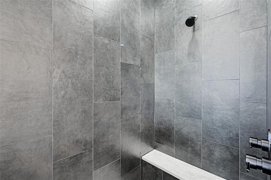 Interior details with a tile shower