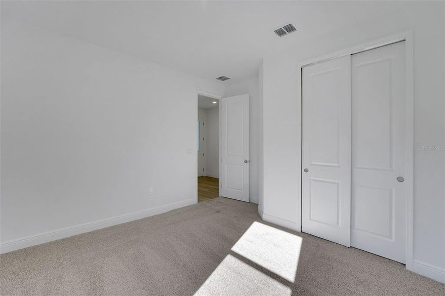 Spacious, unfurnished interior of a new home in Green Key Village, Lady Lake (Image 22).