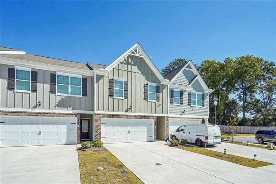 Front exterior of a new home in Chatham, Hampton, GA, highlighting curb appeal (Image 1).
