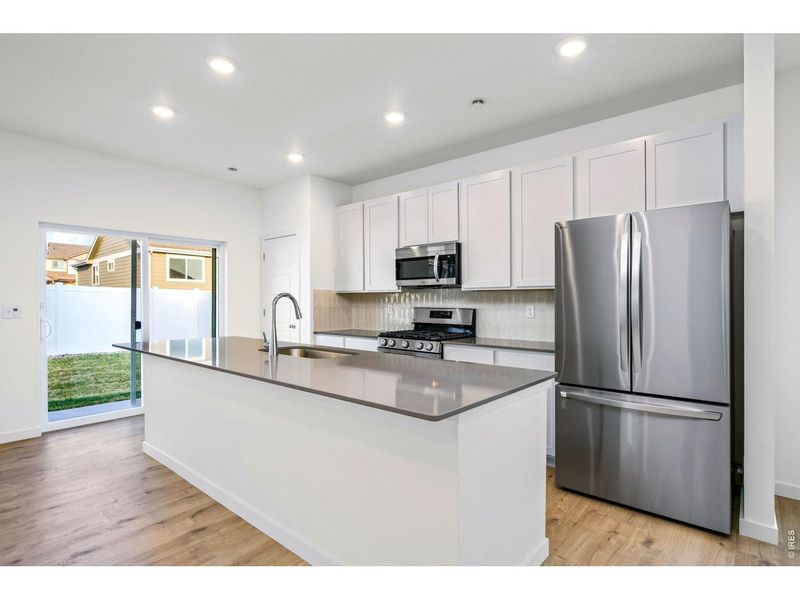 Furnished interior view inside a new home in Union Colony West, Greeley (Image 6).