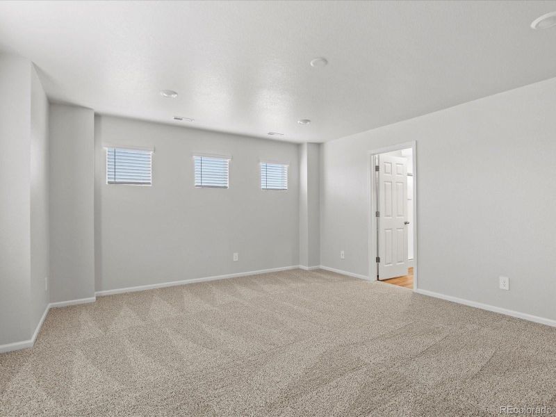 Spacious, unfurnished interior of a new home in Ridgeline Vista: The Flora Collection, Brighton (Image 30). Spacious, unfurnished interior of a new home in Ridgeline Vista: The Flora Collection, Brighton (Image 30).