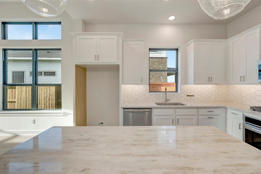 Furnished interior view inside a new home in Sienna - Landmark Row Collection, Missouri City (Image 12).