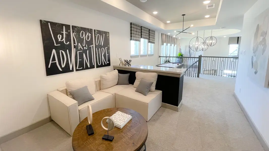 Furnished interior view inside a new home in Sunterra, Katy (Image 3).