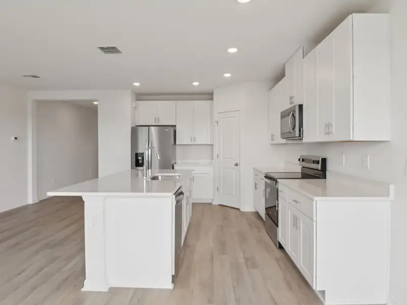 Furnished interior view inside a new home in Hilltop Vistas, Dade City (Image 4).