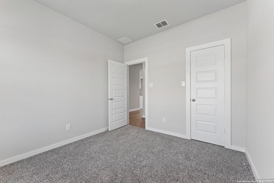 Spacious, unfurnished interior of a new home in Mesquite Ridge, San Antonio (Image 16). Spacious, unfurnished interior of a new home in Mesquite Ridge, San Antonio (Image 16).