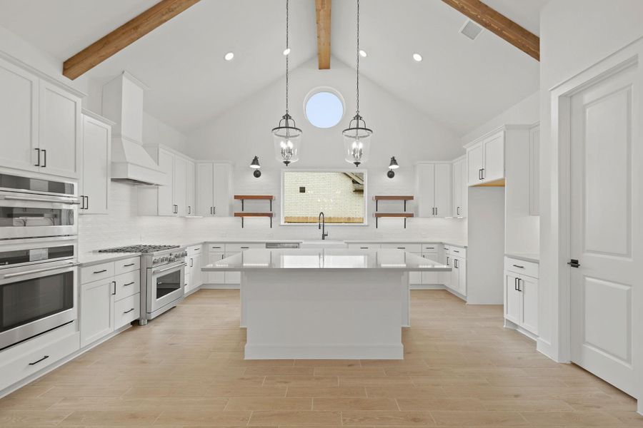 Gourmet island kitchen (*Photo not of actual home and used for illustration purposes only.) Gourmet island kitchen (*Photo not of actual home and used for illustration purposes only.)