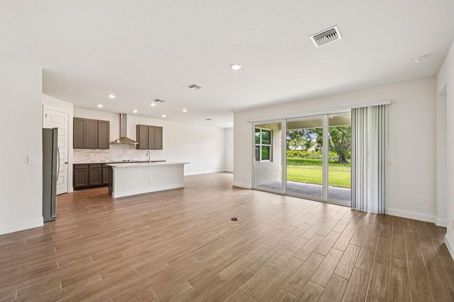 Furnished interior view inside a new home in Hampton Park - Signature Series, Vero Beach (Image 9).