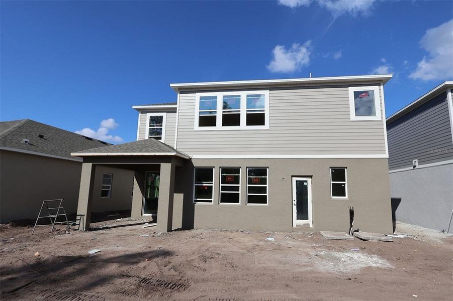 In-progress construction of a new home in Eden at Crossprairie, St. Cloud, FL (Image 7).