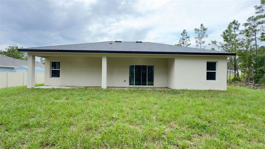 Front exterior of a new home in , Citrus Springs, FL, highlighting curb appeal (Image 17).