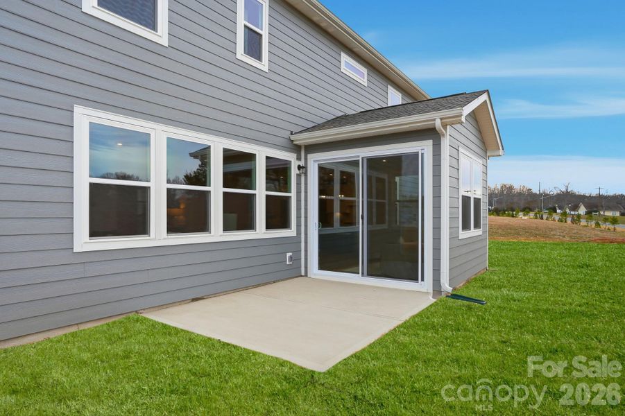 Exterior details and patio area of a home in Blair Place, Monroe (Image 29).