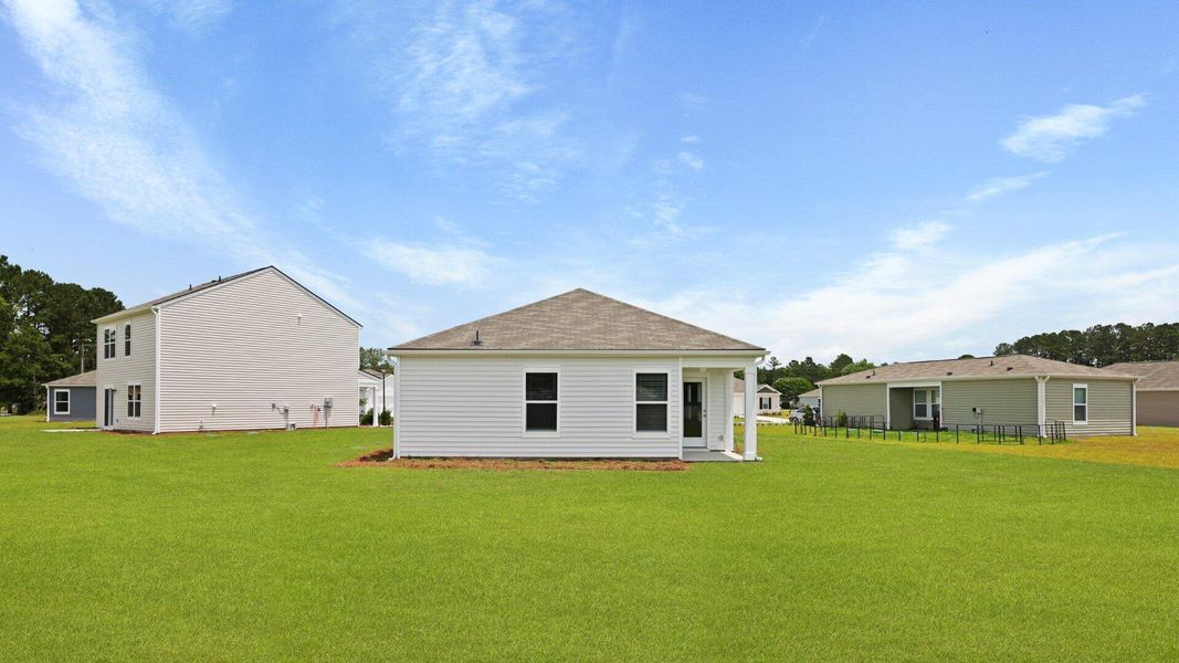 Front exterior of a new home in Evergreen, Holly Hill, SC, highlighting curb appeal (Image 24).