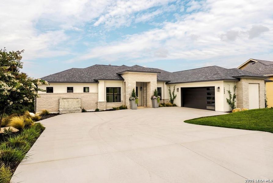 Front exterior of a new home in , Kerrville, TX, highlighting curb appeal (Image 27).