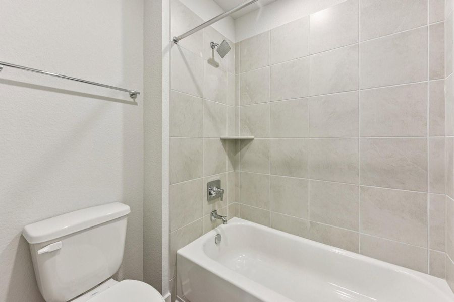 Furnished interior view inside a new home in Stallion Run, Buda (Image 15).