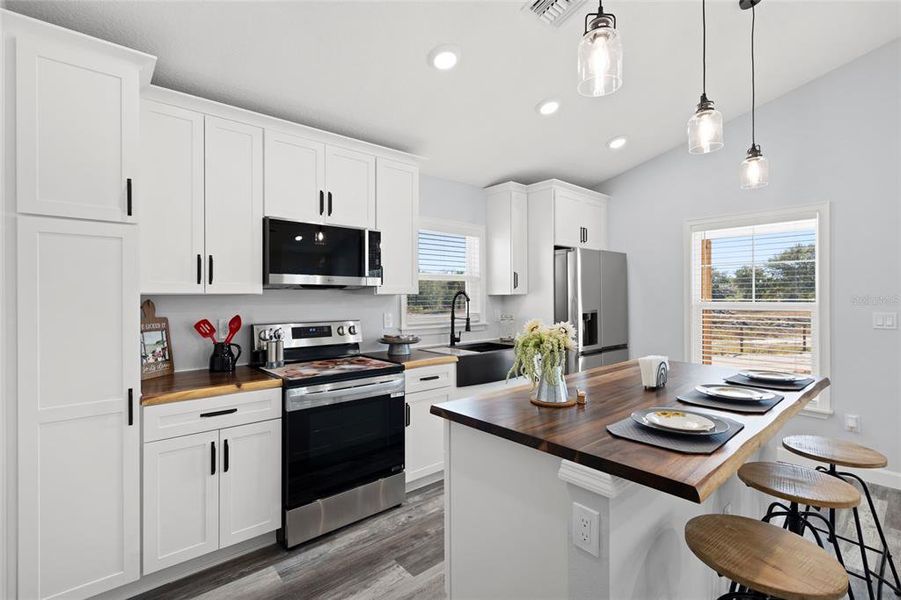 Furnished interior view inside a new home in , Okeechobee (Image 9).