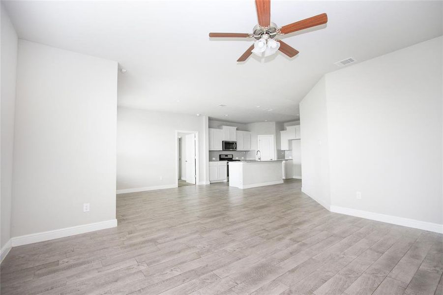 Large living area with dedicated space for a dining table