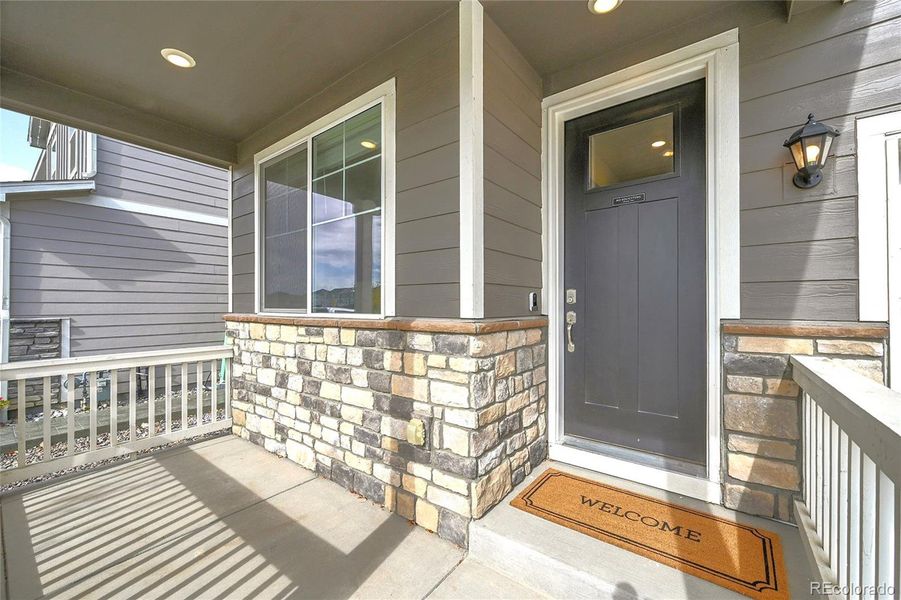 Exterior details and patio area of a home in Settlers Crossing, Commerce City (Image 20).