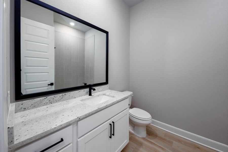 Furnished interior view inside a new home in , Iowa Colony (Image 7).