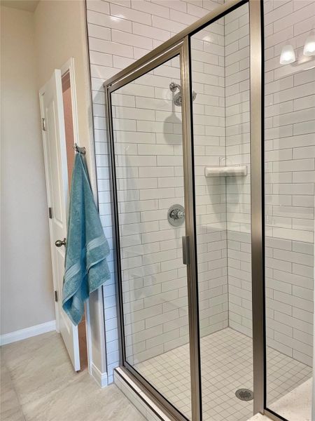 Mud set tile shower floor & tile to the ceiling Mud set tile shower floor & tile to the ceiling