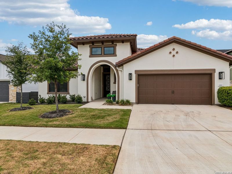 Front exterior of a new home in Kissing Tree, San Marcos, TX, highlighting curb appeal (Image 22). Front exterior of a new home in Kissing Tree, San Marcos, TX, highlighting curb appeal (Image 22).